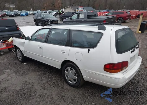 1993 Toyota Camry Le z USA, uszkodzony, nr VIN 4T1VK12W0PU053173